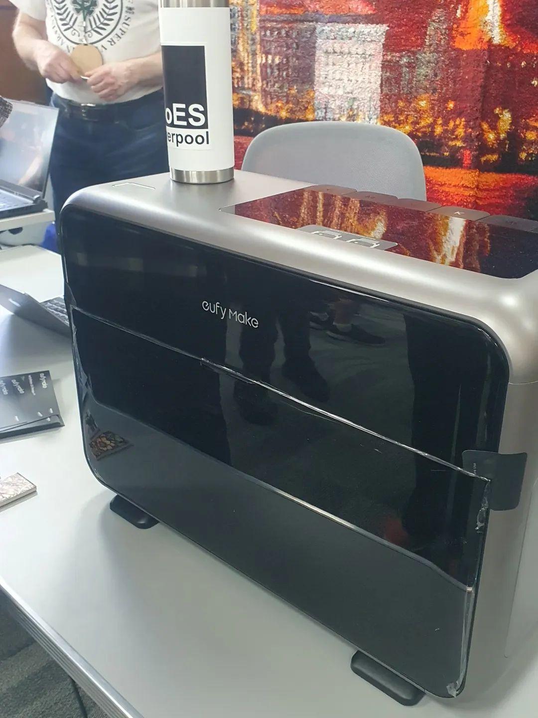 The eufyMake UV texture printer, on a tsble, at Wirral MakeFest 