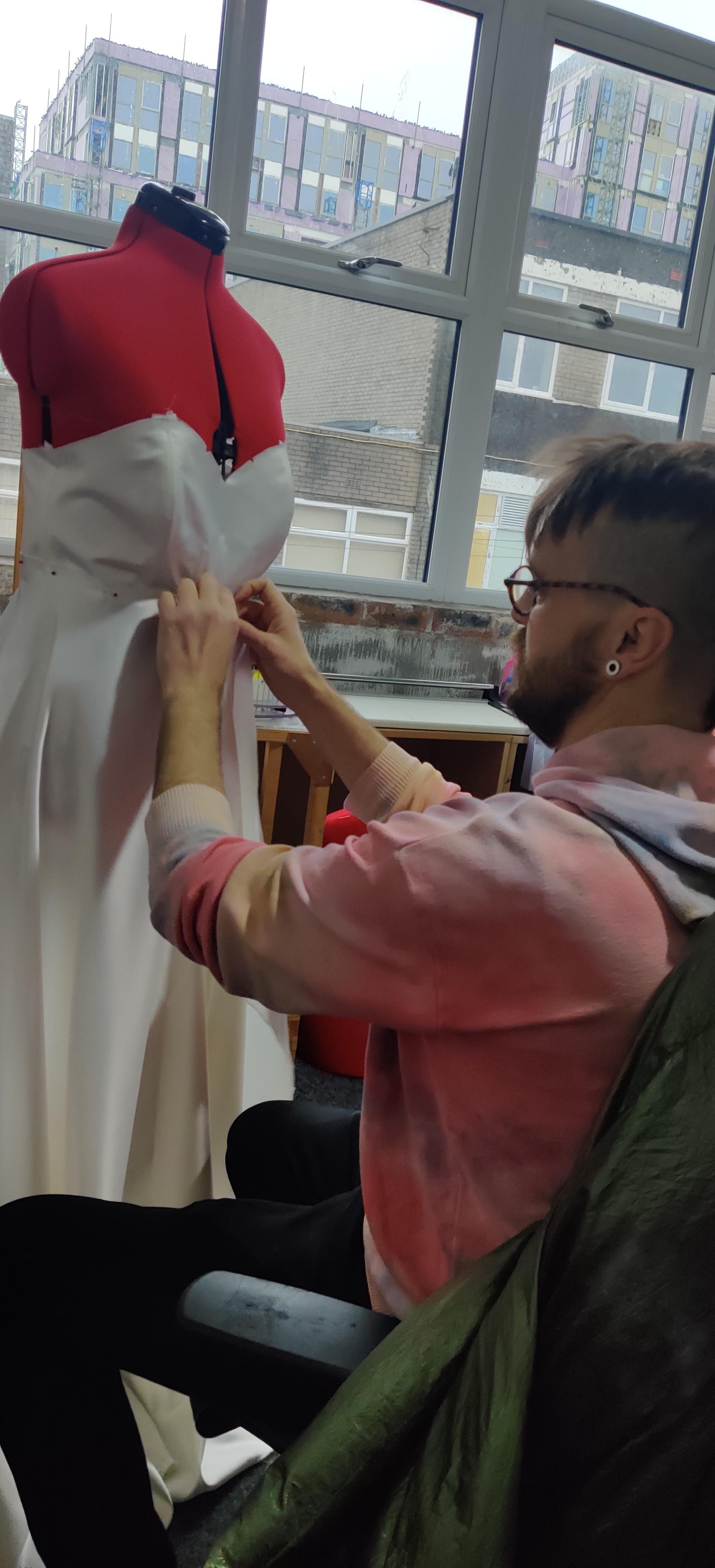 Nick fitting a dress on one of our dressmakers mannequins