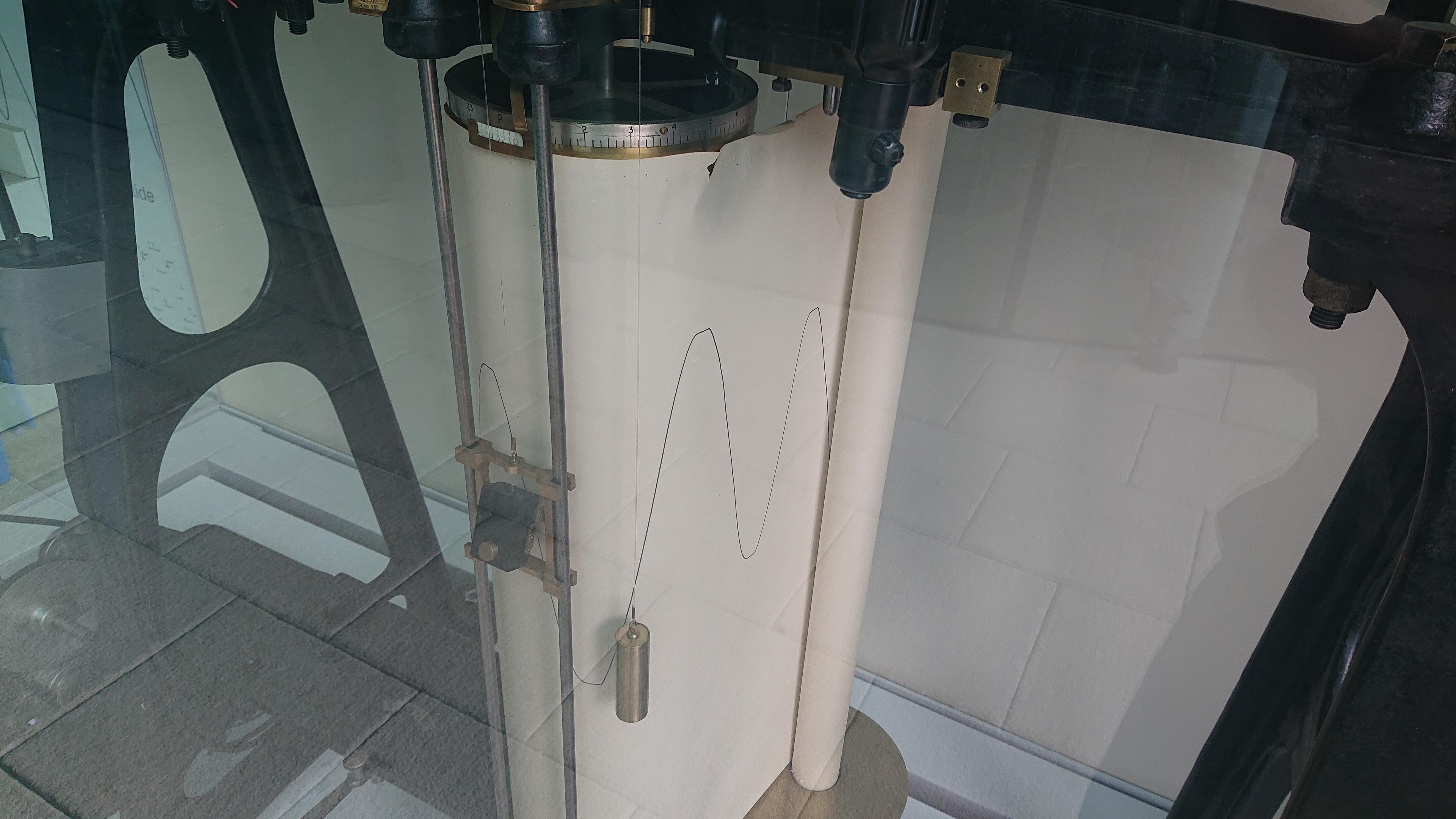 The output stage of the machine. The end of the wire that wends round the pulleys is attached to a pen mechanism that draws a varying amplitude sine wave onto a scroll of paper