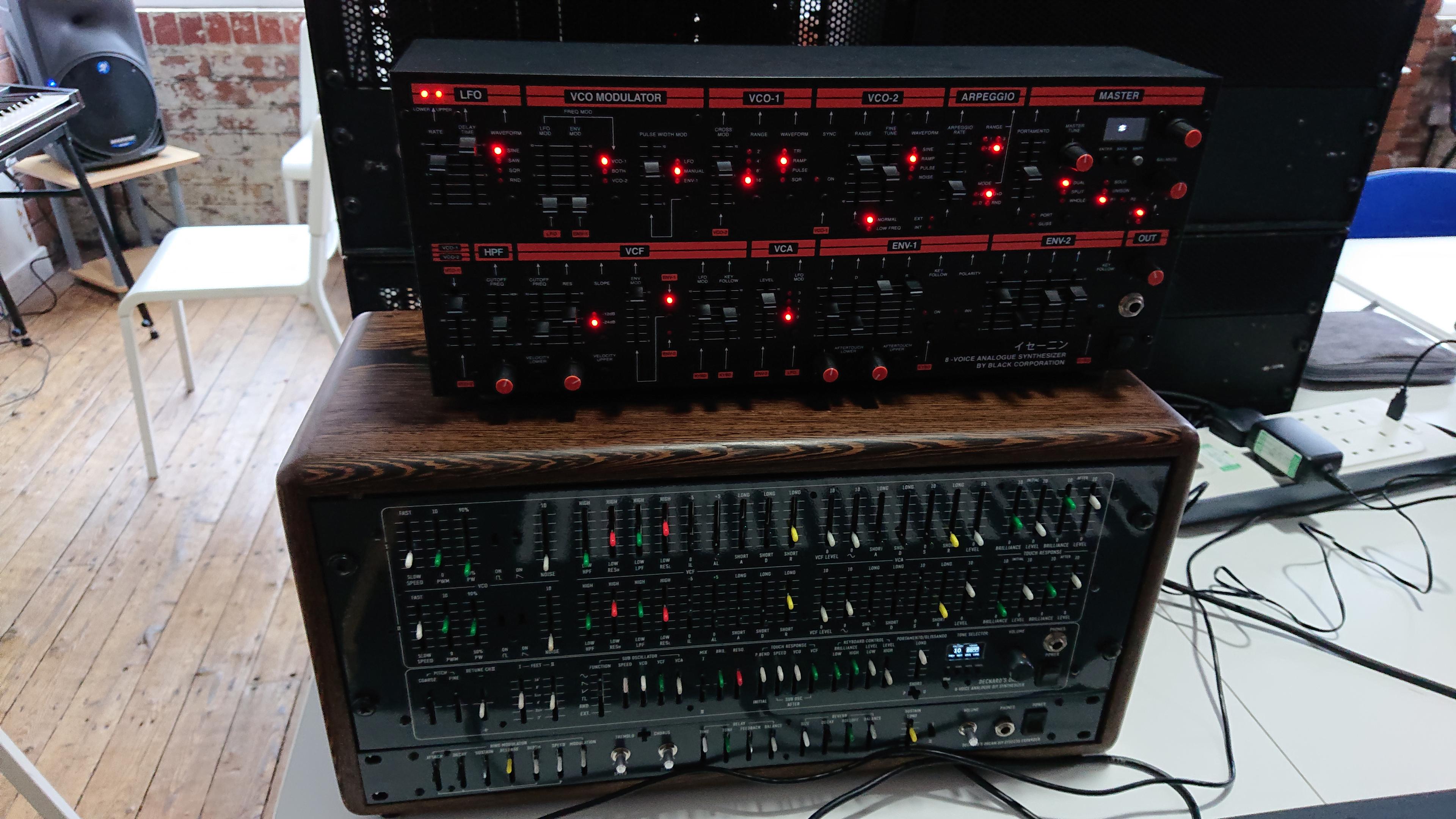 A pair Black Corporation synths, stacked on top of each other. They're 